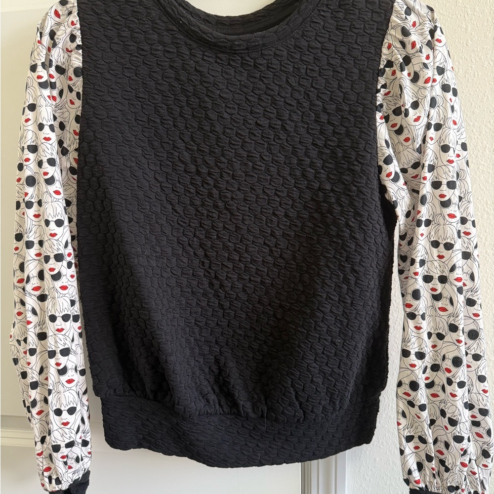 Anthropologie Black Textured Top with Patterned Sleeves